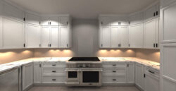 Traditional white cabinets with black handles and inset range