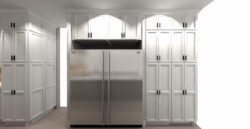 White traditional cabinets with black handles and silver refrigerator